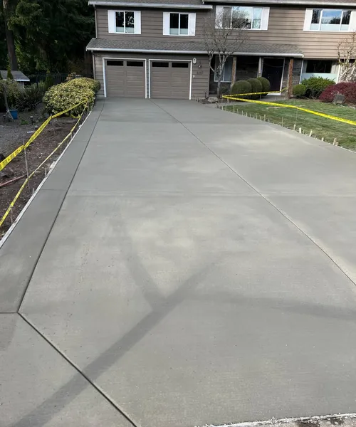 Broom Finish Driveway With Decorative Borders in Edmonds 